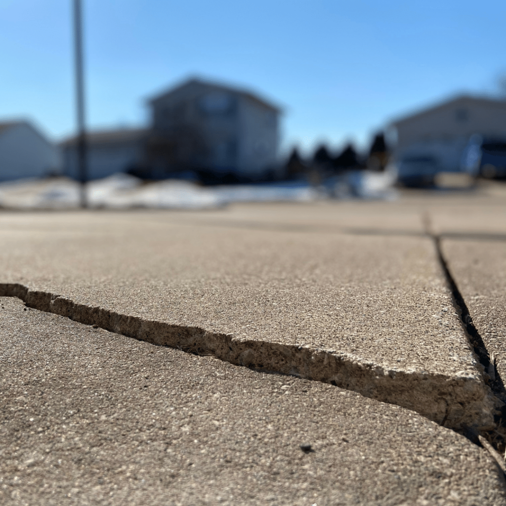 Repairing your cracked driveway with PolyPier is less costly that replacement.