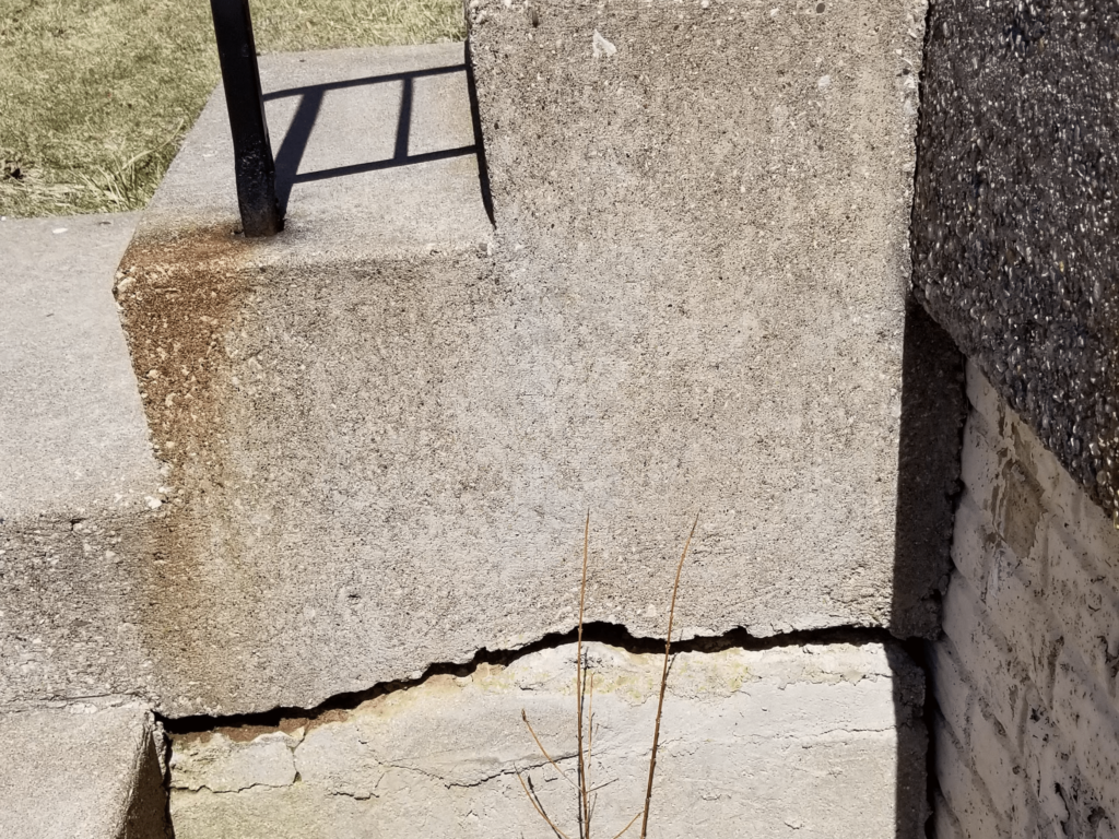 Damaged stair are a trip and fall hazard.